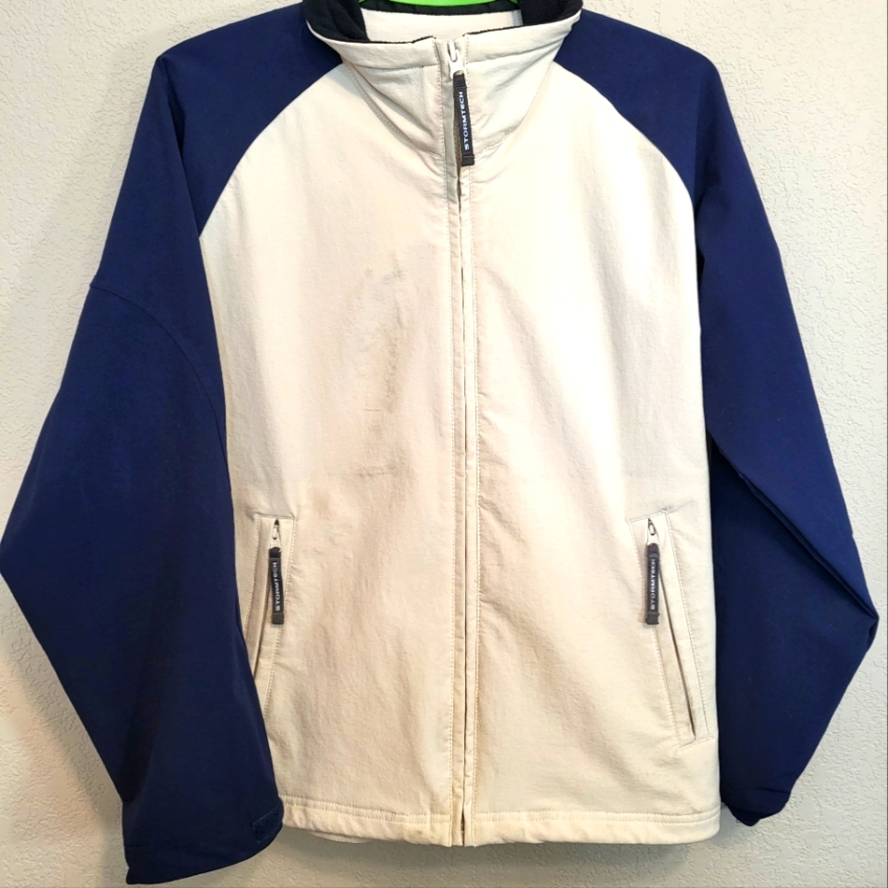 Stormtech rain jacket.  Mens medium.  Cream and navy.